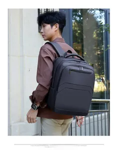 Outdoor view of a waterproof business backpack with ergonomic straps and large capacity