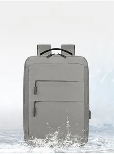 Sac à dos d'affaires gris imperméable avec deux fermetures éclair et port USB
