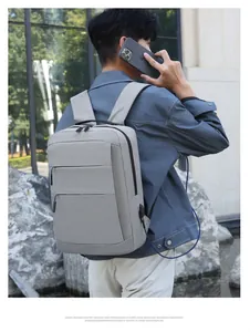 Sac à dos d'affaires gris imperméable pour ordinateur avec port de chargement USB latéral