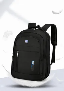 Close-up of lightweight black travel backpack with floating feathers showing portability