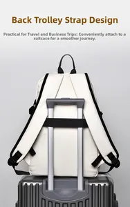 Waterproof travel backpack featuring a back luggage strap design for suitcase attachment
