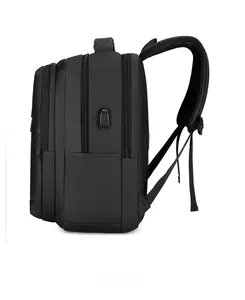 Side view of black business backpack showing integrated USB port and breathable mesh straps