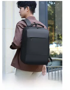 Outdoor view of professional black waterproof business backpack for laptop commuting