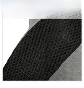 Close-up of thickened breathable honeycomb mesh shoulder straps on black backpack