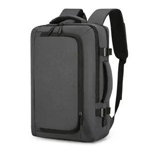 Minimalist charcoal grey 16-inch laptop backpack with USB port and ergonomic design