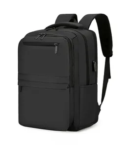 Detail view of black business backpack featuring side USB port and multi-layer structure
