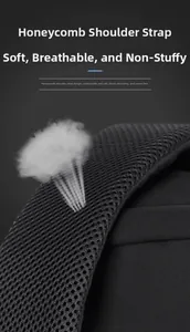 Breathable honeycomb mesh shoulder strap detail with shock-absorbing foam on black backpack