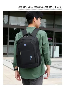 Real-life model display of a large black casual backpack with Sport Fashion logo