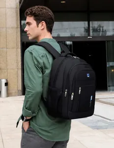 Detail of black waterproof backpack with multiple zipper layers and side mesh pocket
