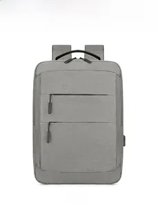 Détail sac à dos Oxford gris imperméable avec double fermeture éclair et port de charge USB