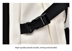 Detailed macro view of high-strength plastic buckle and durable nylon strap on backpack