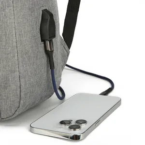 Waterproof 16-inch gray laptop backpack featuring an external USB charging port