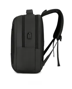 Side view of black business backpack showing multi-layer zippers and USB charging port