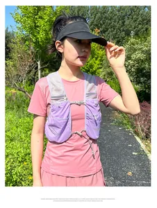 Close-up of purple running vest showing breathable mesh and adjustable buckles