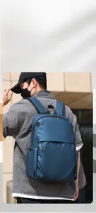 Blue waterproof nylon backpack for urban commuting with large storage compartments