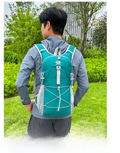 Detail showing the adjustable side straps and mesh pockets of the hiking backpack