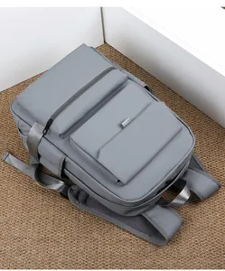 Close-up of grey waterproof backpack fabric with honeycomb breathable mesh on back straps