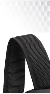 Detail of breathable honeycomb mesh shoulder straps on a black business laptop backpack