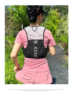 Macro view of breathable mesh back and V-shaped reflective strips on marathon vest