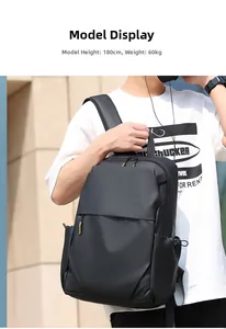 Minimalist black waterproof backpack on model, height 180cm, showing commute size and style