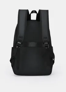 Back view of black travel backpack showing luggage strap and padded shoulder straps