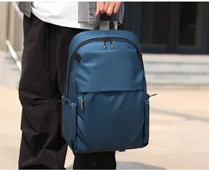 Deep blue business backpack with waterproof fabric and yellow contrast zipper detail