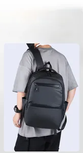 Waterproof black business backpack featuring multiple exterior zipper pockets for daily commute