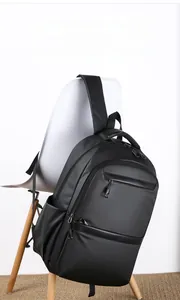 Detail of wear-resistant and water-repellent tech fabric on black business backpack