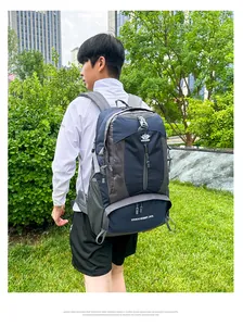 Detail view of 50L waterproof hiking backpack with ergonomic shoulder straps and mesh pockets