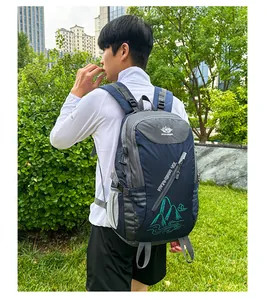 Outdoor 40L hiking backpack in navy blue and grey featuring padded shoulder straps