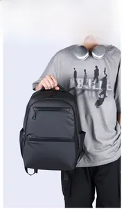 Detailed view of lightweight black business backpack with waterproof matte texture
