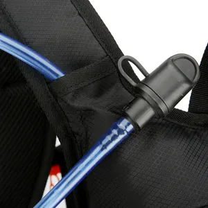Outdoor cycling backpack strap detail with hydration hose and bite valve attachment