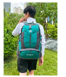 Close-up of a 50L green outdoor hiking backpack showing straps and water-resistant fabric