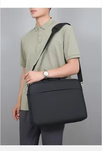 Business laptop bag with adjustable nylon shoulder strap and sleek front zipper pocket