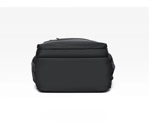 Detailed bottom view of the large-capacity black business laptop backpack showing stitching