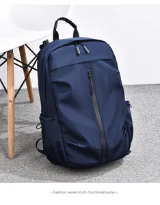 Detail view of water-resistant navy blue backpack with vertical zipper and side pockets