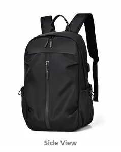 Side view of a black high-density waterproof business backpack with a USB charging port