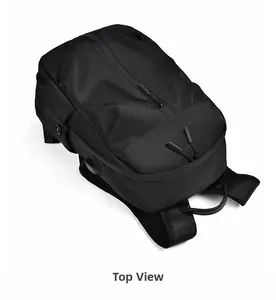 Top view of large black business backpack showing durable handle and dual zippers
