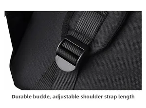Close-up of durable plastic buckle and adjustable woven strap on black laptop backpack
