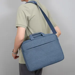 Blue minimalist business laptop bag with adjustable shoulder strap and large capacity