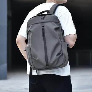 Men's large capacity travel backpack in dark grey-brown for outdoor commuting use