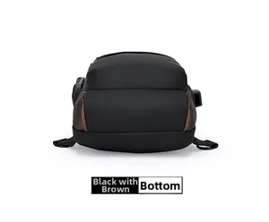 Detail view of the black and brown chest bag bottom with durable waterproof fabric