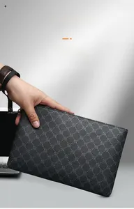 Detail of grey men's business clutch bag with woven texture and side handle strap