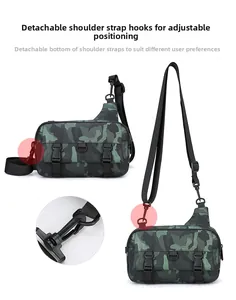 Detail view of the detachable shoulder strap hook on a camo crossbody sling bag