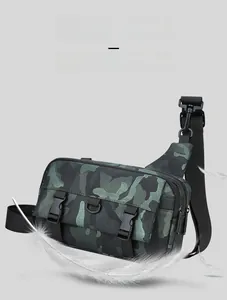 Macro shot of tactical camo crossbody bag detail with secure plastic buckle and D-ring hook