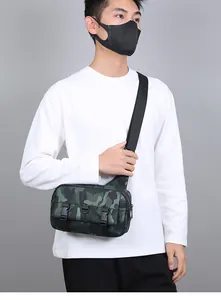 Men's green camo crossbody bag featuring double buckles and D-ring on the shoulder strap