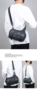 Detailed view of NIID urban nature crossbody bag in dark grey and olive camouflage
