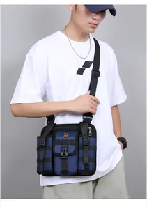 Outdoor tactical crossbody bag with side pockets and buckle closure shown on model