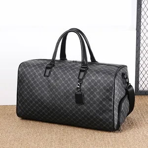 Grande borsa da viaggio grigia con motivo a rombi, manici in pelle e scomparto per scarpe