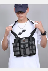 Tactical chest bag detail showing multiple pockets, durable fabric, and adjustable buckles